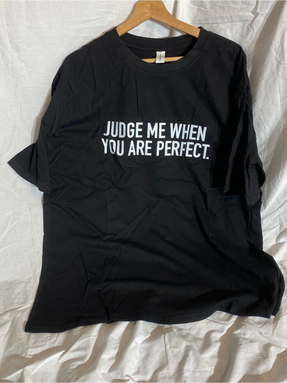 Black Short-Sleeve Graphic Tee with White Text